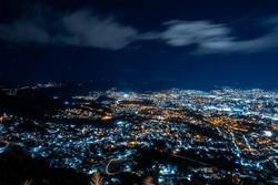 Wide Panoramic Colorful Tegucigalpa Night Cityscape Long Exposure Shot With Blurred Clouds