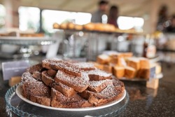 Many slices of chocolate cake in an hotel restaurant buffet