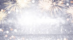 New Year Abstract background holiday, Gold and silver Fireworks and bokeh, copy space.