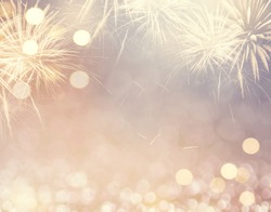 Gold Vintage Fireworks and bokeh in New Year eve and copy space. Abstract background holiday.