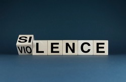 Silence - Violence. Cubes form the words Silence - Violence. Silence - Violence concept