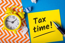 Tax time -15th April 15 - Tax day in USA. Notification of the need to file tax returns, tax form at accauntant workplace
