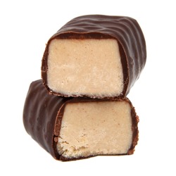 Chocolate candies sweets with praline filling isolated on the white