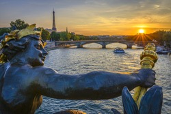 Pont des Invalides and Eiffel tower at sunset from Pont Alexandre III