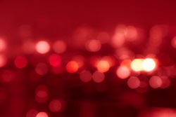 Red tone blur bokeh light. Defocused  background.