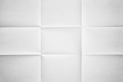 White paper folded in nine fraction background