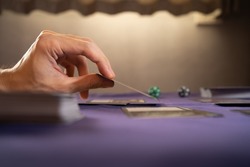 Playing trading card game on a table