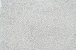 Cracked white ceramic texture background