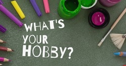 Composition of what's your hobby text with art supplies on table. national hobby month, hobbies, art and craft concept.
