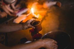 cacao ceremony with fire and smoke