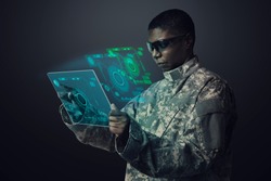 Military officer using transparent tablet army technology