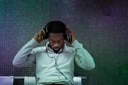 Musical gadget innovation man wearing headphone entertainment technology remixed media