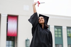 Girl graduating high school, celebrating academic achievement