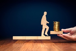Personal development leads to higher earnings. Motivational financial concept with wooden person and blocks. Exploit your own potential for higher earnings.