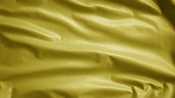 Yellow textile cloth flag, background abstract with soft waves. Close up of Quebec, called the Yellow Jack, used to be careful with water on a beach. Realistic fabric texture with softness mood wavy