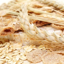 Healthy food, flakes and crisp bread with grain on white background.
