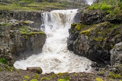 Powerful Nykurhylsfoss (Sveinsstekksfoss) waterfall in Fossardalur, Iceland 