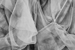 Close-up of plastic net. Artistic texture or background. Abstract plastic net texture. Background in black and white.