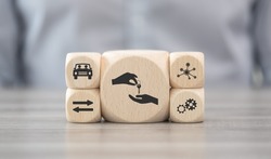 Wooden blocks with symbol of car sharing concept