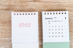 January calendar 2022 on wooden background.