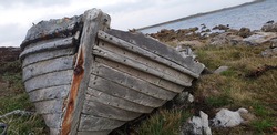 old damaged boat on the shore in the Falklands 