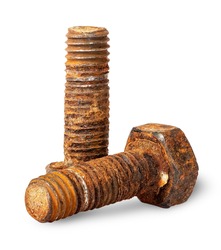 Two old rusty bolts of each other isolated on white background