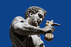 Sculpture of Sacred Peter with a key before St. Peter's Cathedral, Vatican