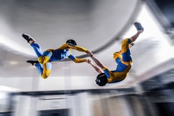 I flying. Skydiving in Russia wind tunnel. Indoor skydiving. Training in wind tunnel. New  sport in flight technology. Flying in fast wind