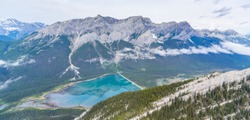 Helicopter aerial view of Banff National Park overlooking the beautiful Rocky Mountains