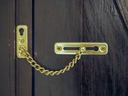 Lock the door with a door chain