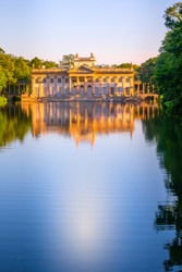 Poland, Warsaw. Lazienki palace with reflection in pond water in the park, Lazienki Krolewskie