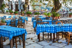 Typical greek tavern, restaurant or cafe view at Makrinitsa village of Pelion, Greece