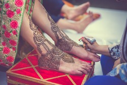 Indian bride's wedding henna mehendi mehndi feet close up