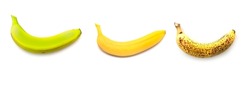 Three kind of banana: unripe, green, normal ripe, overripe isolated on white. Side view. 