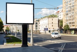 Blank large billboard in a residential area of the city. Mock-up.