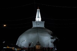 Ruwanwelisaya stupa in Anuradhapura, Sri Lanka at night. Ruwanwelisaya is a sacred place for Buddhists and one of the largest stupas in the world.