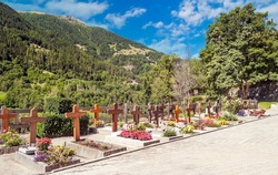 Tombs in the Grimentz cemetery in the Saint Luc valley on a sunny day.