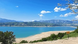 Charvak reservoir with blue sky
