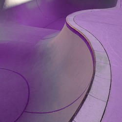               old purple skatepark on the street, skate court structure                 