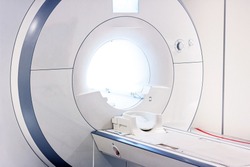 Magnetic resonance imaging (MRI) scanner facade in the hospital room. Medical CT scan system equipment