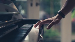 Hand On Piano Key