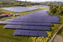 Hectares of former farmland or agricultural areas in the countryside used as a solar farm. At Miagao, Iloilo, Philippines.