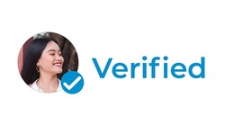 A blue checkmark next to a profile picture. A verified personal social media account indicated by a blue check. A validated and authenticated identity.