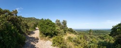 Hiking trail to the summit of Pic de Saint-Loup, the emblematic mountain of the French city of Montpellier, Languedoc-Roussillon, southern France, Europe