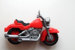 Toy motorcycle on a white background for your website or commercial activities.