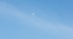 half moon on blue sky background