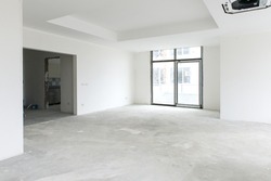 Unfinished building interior, white room.Repairs in the apartment. Preparing in the room.
