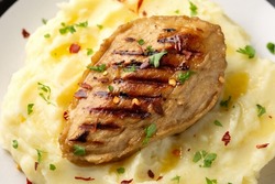 Vegan vegetarian Plant based chicken breast served with mashed potato