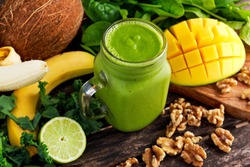 Healthy Green Reach Vitamins Smoothie with baby leaf spinach, kale, mango, banana, lime, walnut and coconut water.