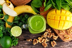 Healthy Green Reach Vitamins Smoothie with baby leaf spinach, kale, mango, banana, lime, walnut and coconut water.